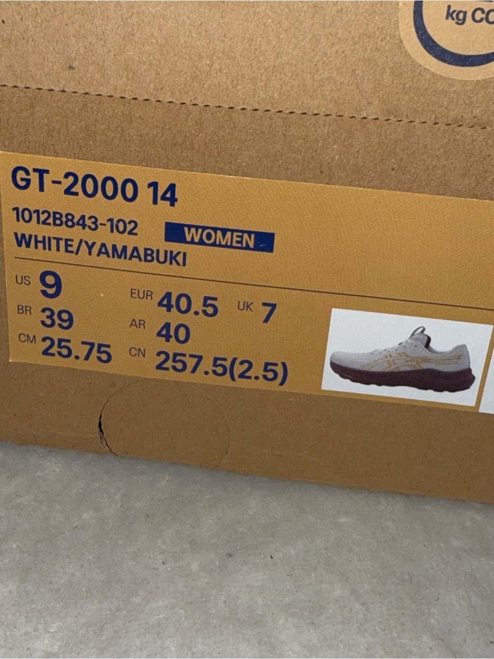 ASICS White Athletic Shoes with Purple Soles and Yellow Stripes - Picture 5 of 5